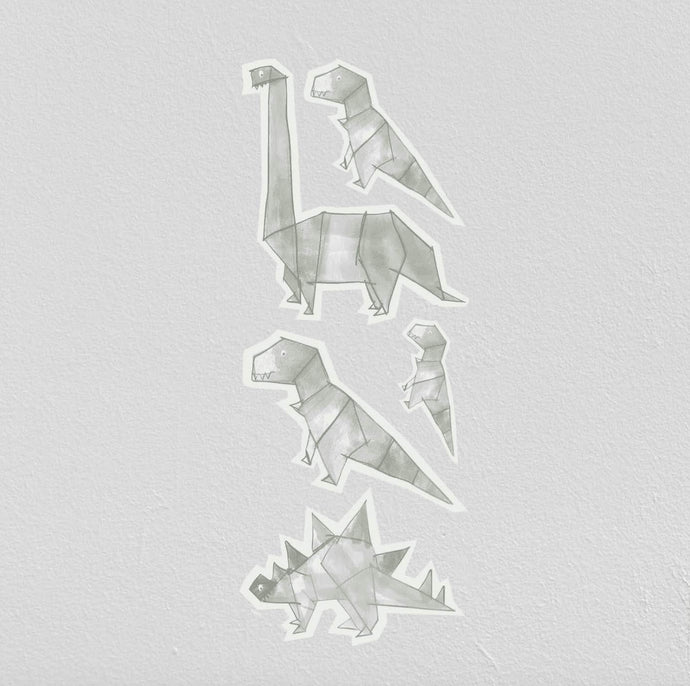Os nossos autocolantes dinossauros aplicados numa parede.